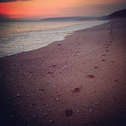 Fresh footprints across Loe Bar on the Penrose Estate